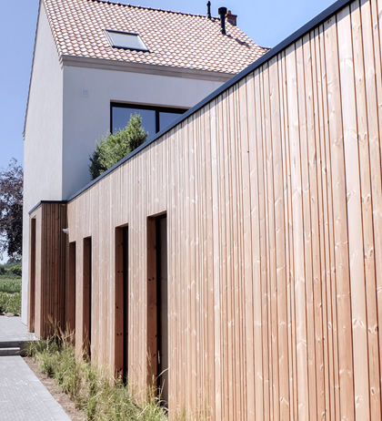 Nieuwe aanbouw bij halfopen bebouwing Malle