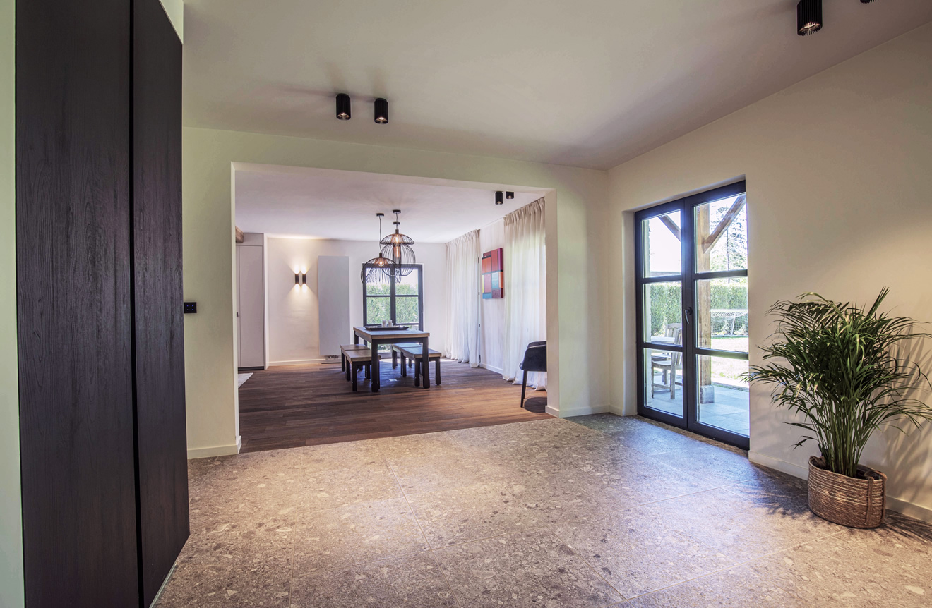 Totaalrenovatie door integratie garage bij leefruimte in Sint Martens Latem